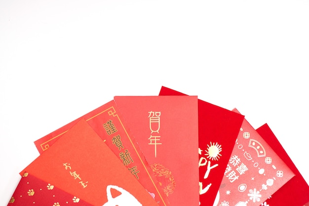 Red envelope packet chinese new year, hongbao with the character 'Happy New Year' on white background for Chinese New Year. Translation: Good luck in the year