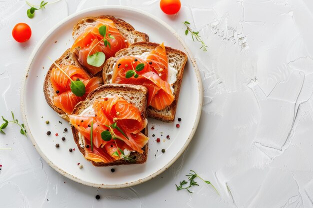 Photo red fish open sandwiches for breakfast on a white plate healthy omega rich dish photographed on a white background flat lay with copy space