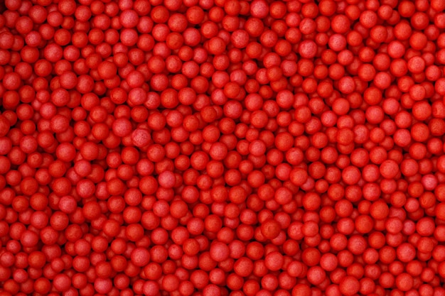 Red foam beads background Valentine day