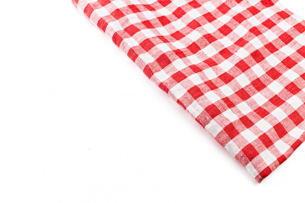 Red folded tablecloth isolated on white