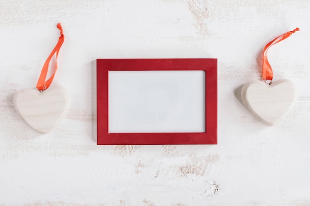 Red frame with big wooden hearts