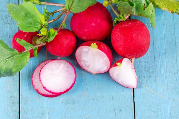 Red fresh radish on wooden