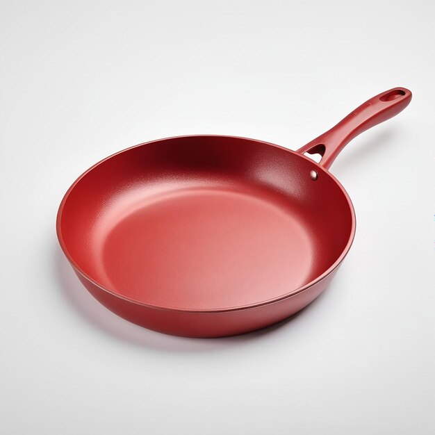 Red frying pan isolated on white