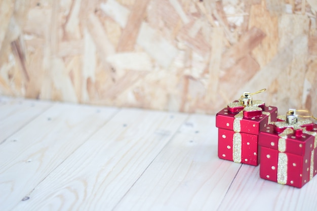 Red gift box on wooden table