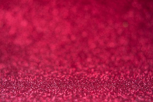 Red glitter bokeh texture background