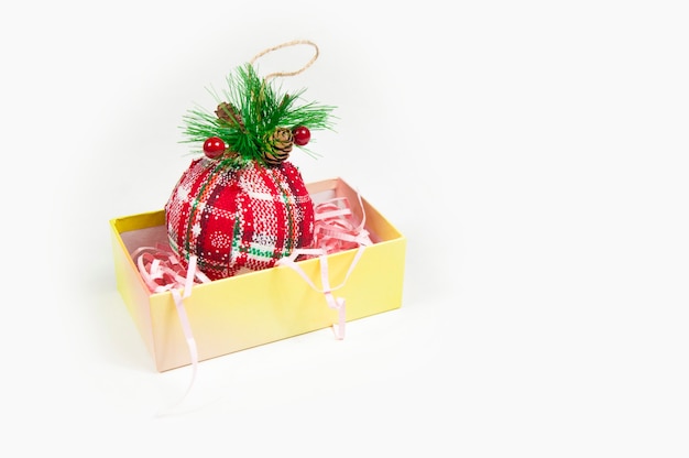 red glove with a cone for the Christmas tree