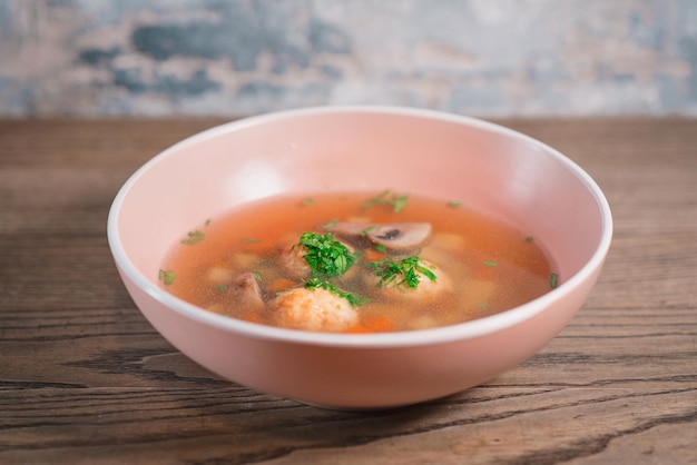 red goulash or borscht in the plate on the table