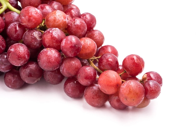 Red grapes on a white background