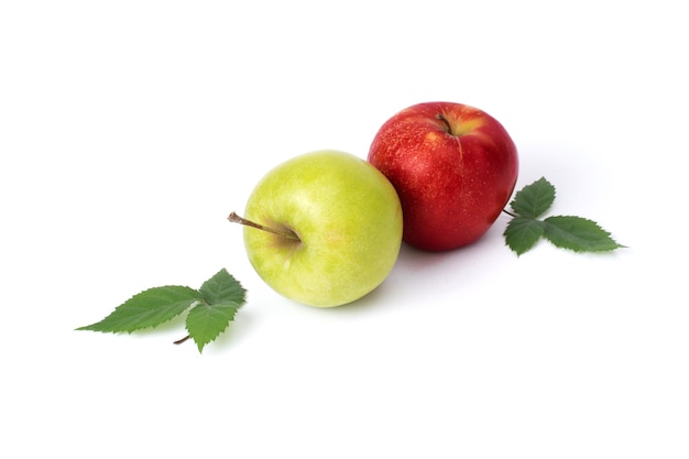 Red and green apple on a white background. Green and red apples juicy on an isolated background. A group of two apples with green leaves on a white background.