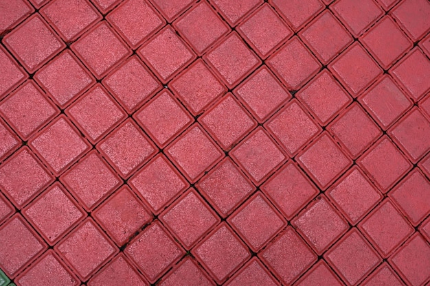 red green color paving block slabs in city, pedestrian street, pavement texture, tiled pathway,