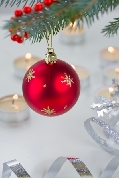 Red hanging ball and christmas lights