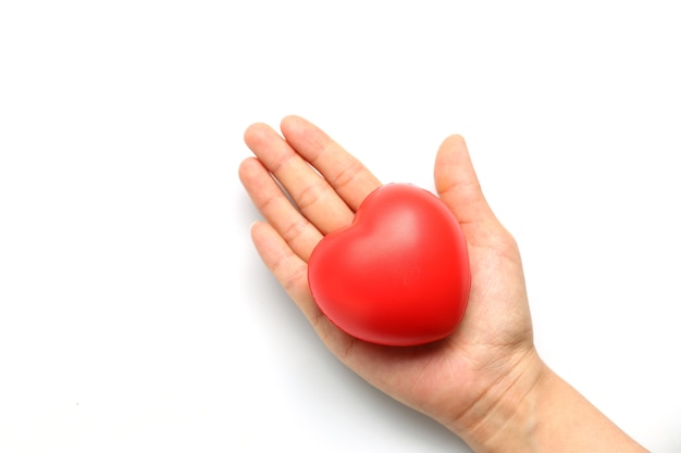 Red heart in hands