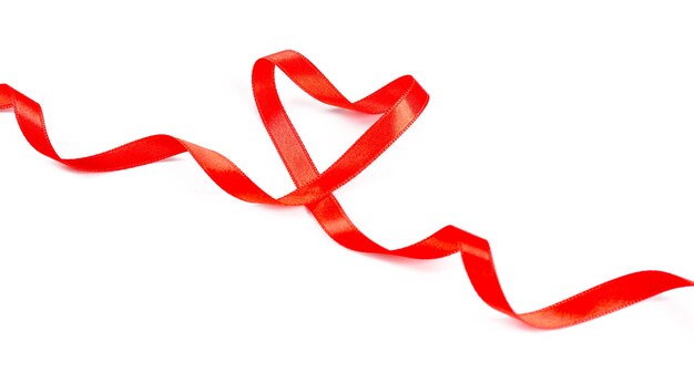 Photo red heart ribbon isolated on white