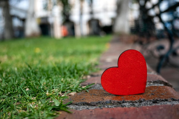 red heart with green blur background, valentine's day