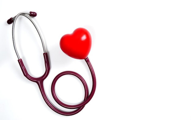 Red heart with stethoscope on white background Selective focusHealth and Medical concept