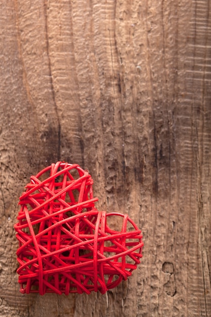 Red heart over wooden background for Valentines