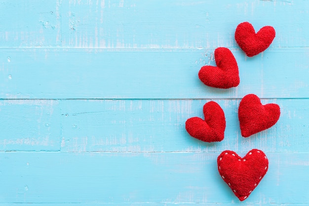 Red hearts on blue wooden background, Love, Valentines day concept.