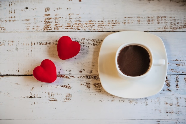 Red hearts and a Cup of coffee