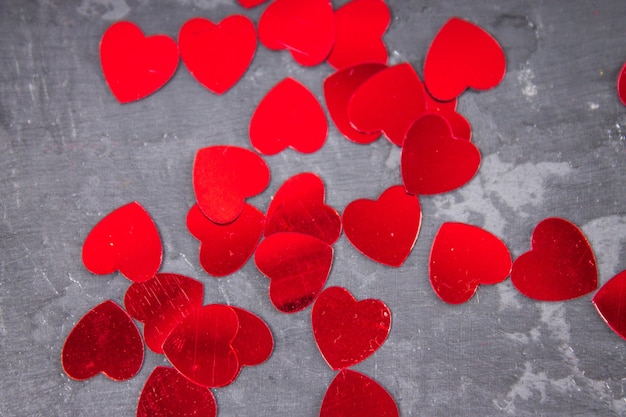 Red hearts on a gray background The symbol of the day of lovers Valentine's Day Concept February 14