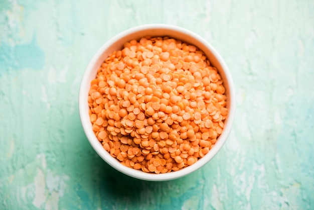 Red Lentil or Lal Masoor ki dal in a bowl, selective focus