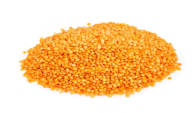 Red lentils isolated on white