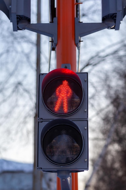 Red light on a pedestrian traffic light Safe crossing of the road