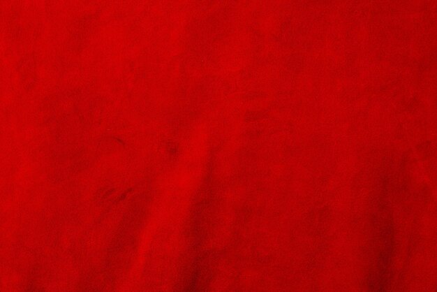 Red matte background of suede Velvet texture of seamless leather Red suede texture