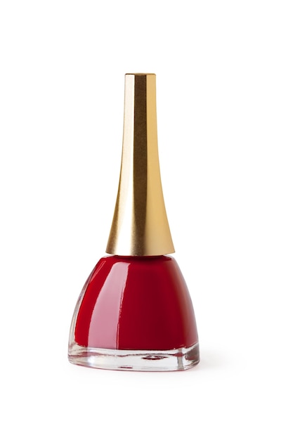 Red nail polish bottle on white background