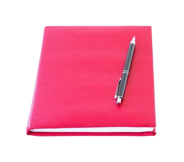 A red notebook and black pen above it isolated on a white background education concept back to school and business concept