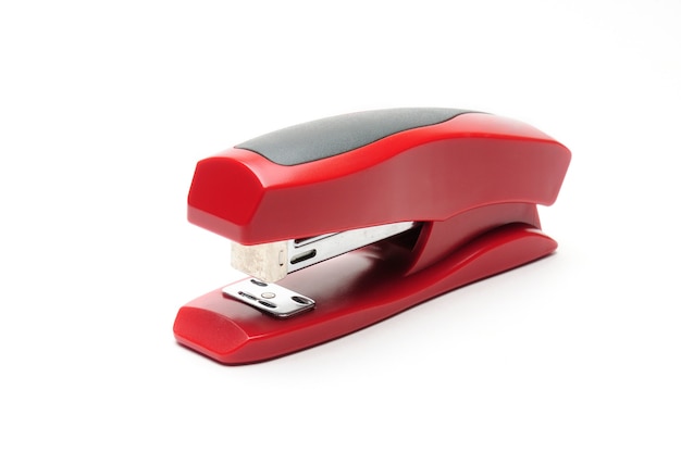 Photo red office stapler on white