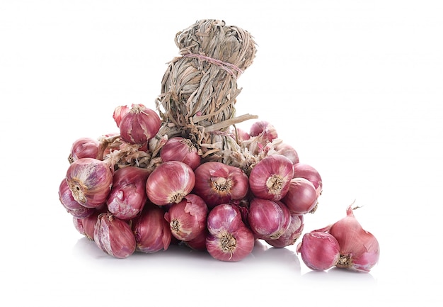 Red onion on white background