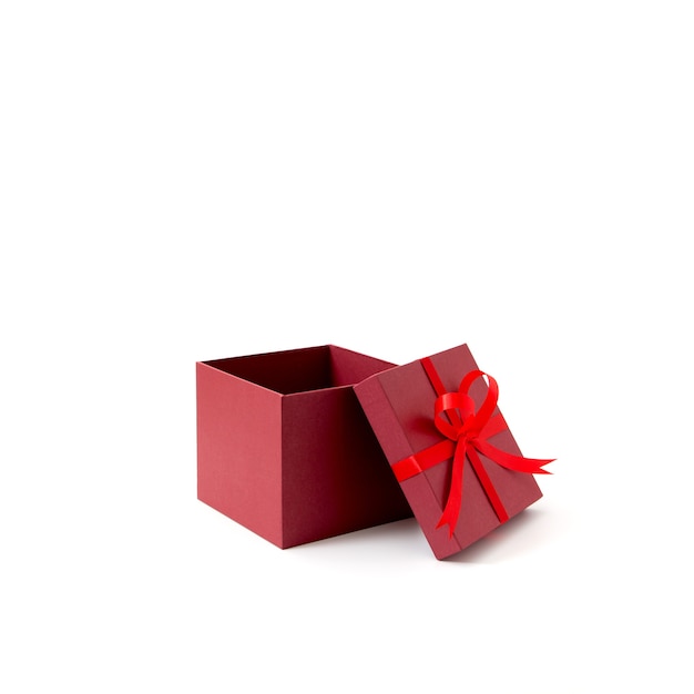 Red open gift box with ribbon isolated on white background