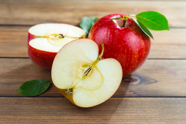 Red organic apples on table