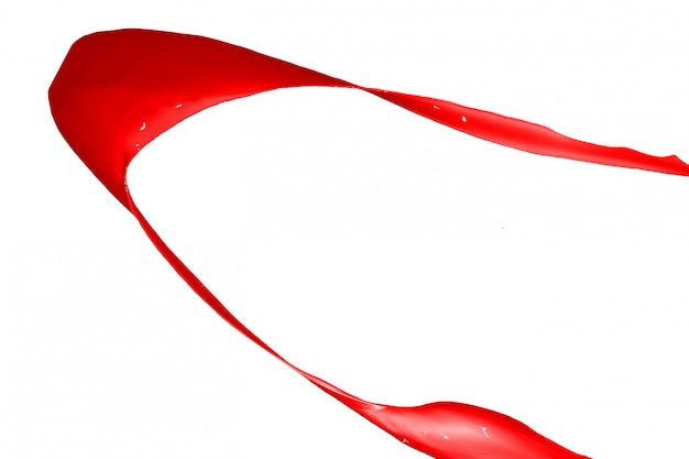 Red paint splash isolated on white background. 