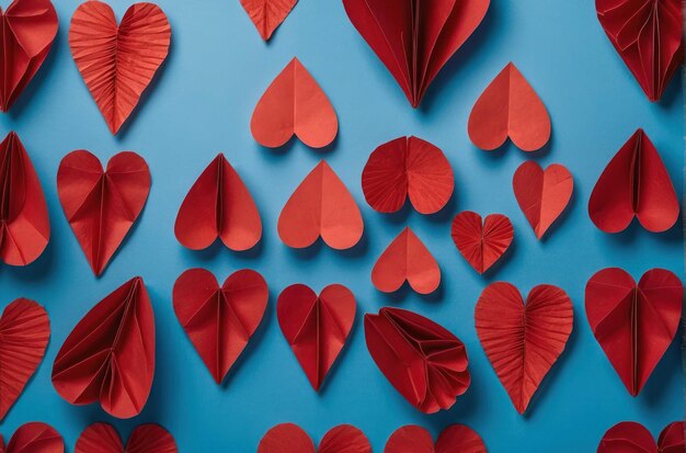 Red Paper Hearts on Blue Background