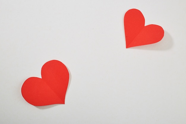 Red paper hearts isolated on white background for saint valentines day