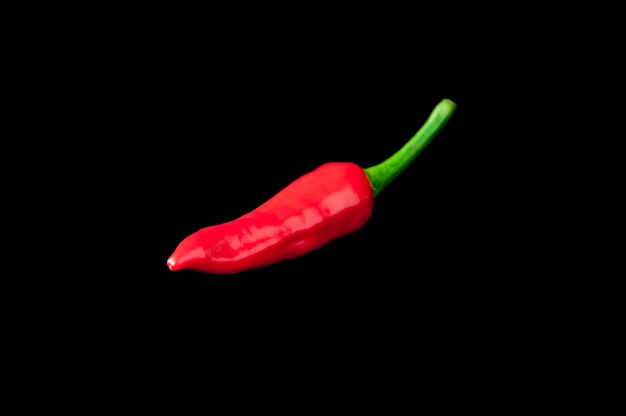 Red pepper black black background