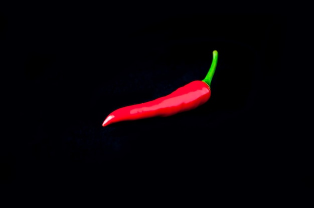 Red pepper black black background