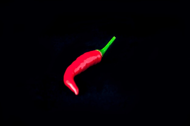 Red pepper black black background