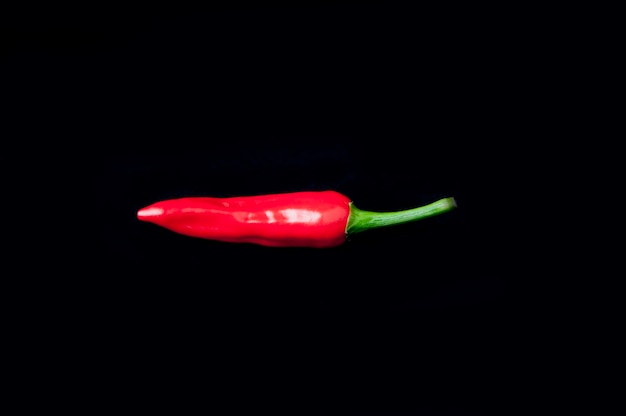 Red pepper black black background