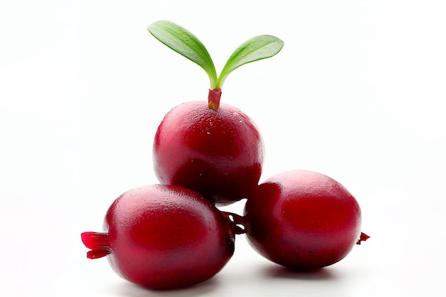 A red pomegranate with green leaves on it