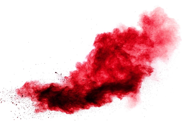 Red powder explosion on white background