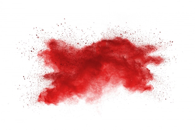 Red powder explosion on white background