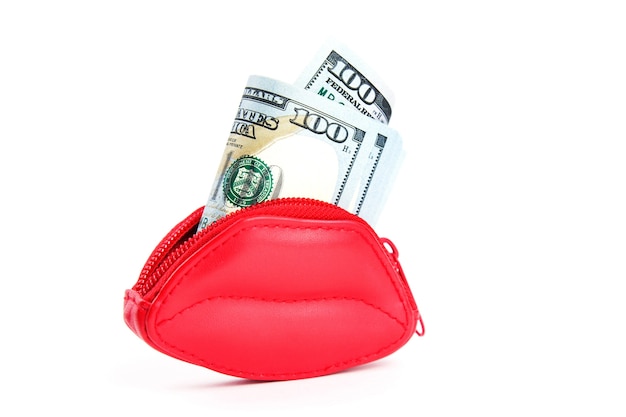 Red purse in the form of lips and banknotes of one hundred dollars.