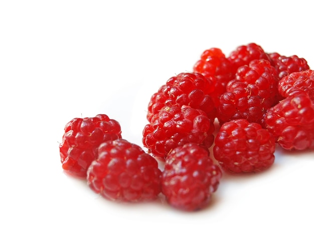 Red raspberries isolated white background with shadow