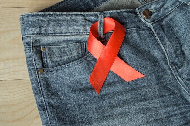 Red ribbon on the Genie is a symbol of struggle and awareness AIDS