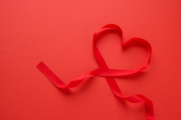 Red ribbon in the shape of a heart