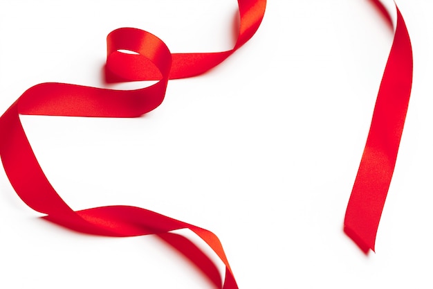 Red ribbon on white background