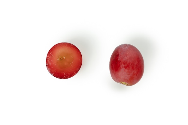 Red ripe grape isolated on white background