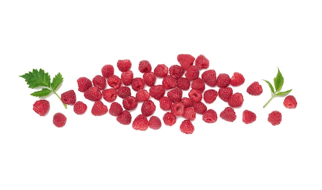 Red ripe raspberries and green leaves on a white background View from above